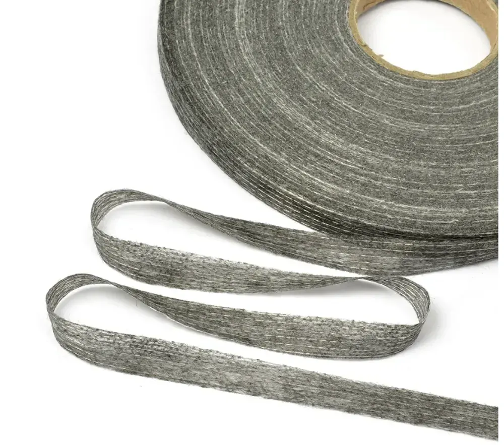 Порезанный и простроченный флизелин (Долевик) 15 мм Серый (100 м)
