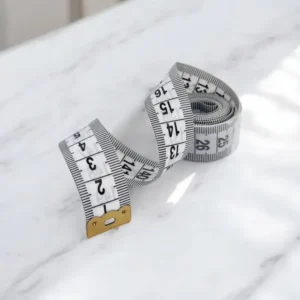 Сантиметр кравецький в пластиковому контейнері двосторонній Білий 150/60 сантиметри/дюйми